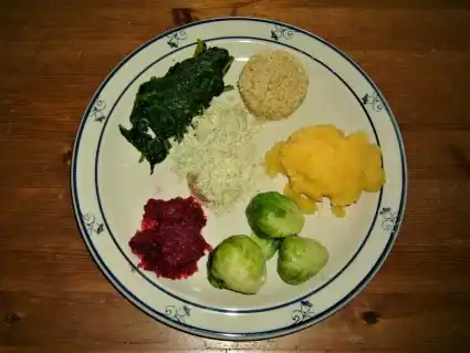 An image showing various plant based sources of food for canines