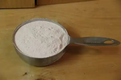 Image of ground eggshells in a measuring cip.